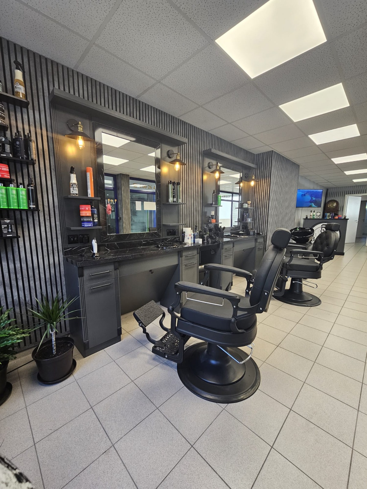 Another modern barbershop interior with professional equipment